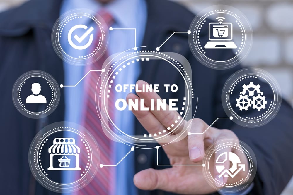 Businessman,Using,Virtual,Touchscreen,Presses,Inscription:,Offline,To,Online.,Transition